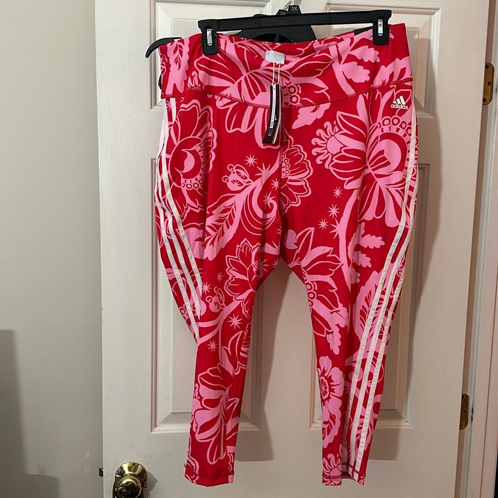 Brand new, with tags. Red and pink Adidas striped tights.
